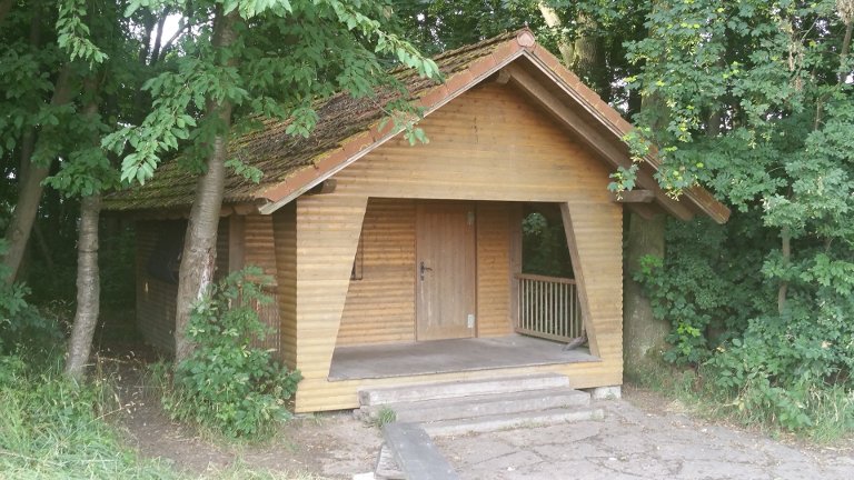 Bild der Blockhütte